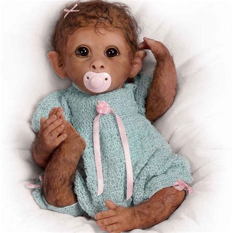 Featuring RealTouch vinyl skin to feel the most lifelike. . Reborn doll monkey